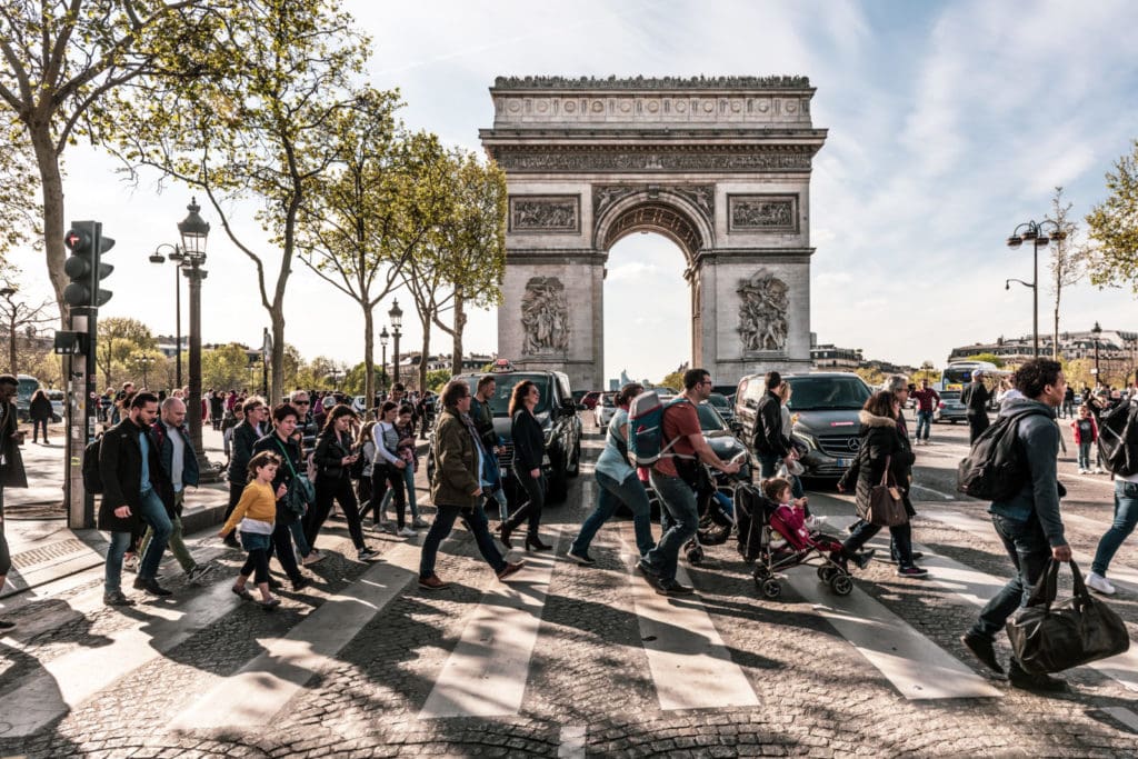 People walking in front of Arc de Triomphe, Paris