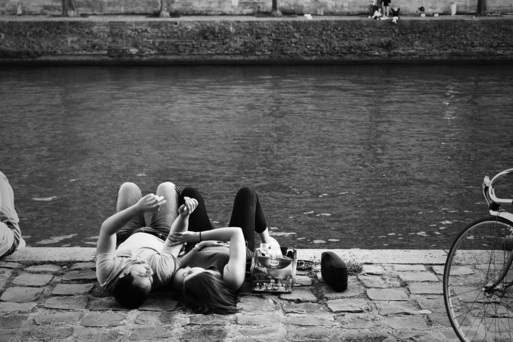 A couple on the Seine river in Paris