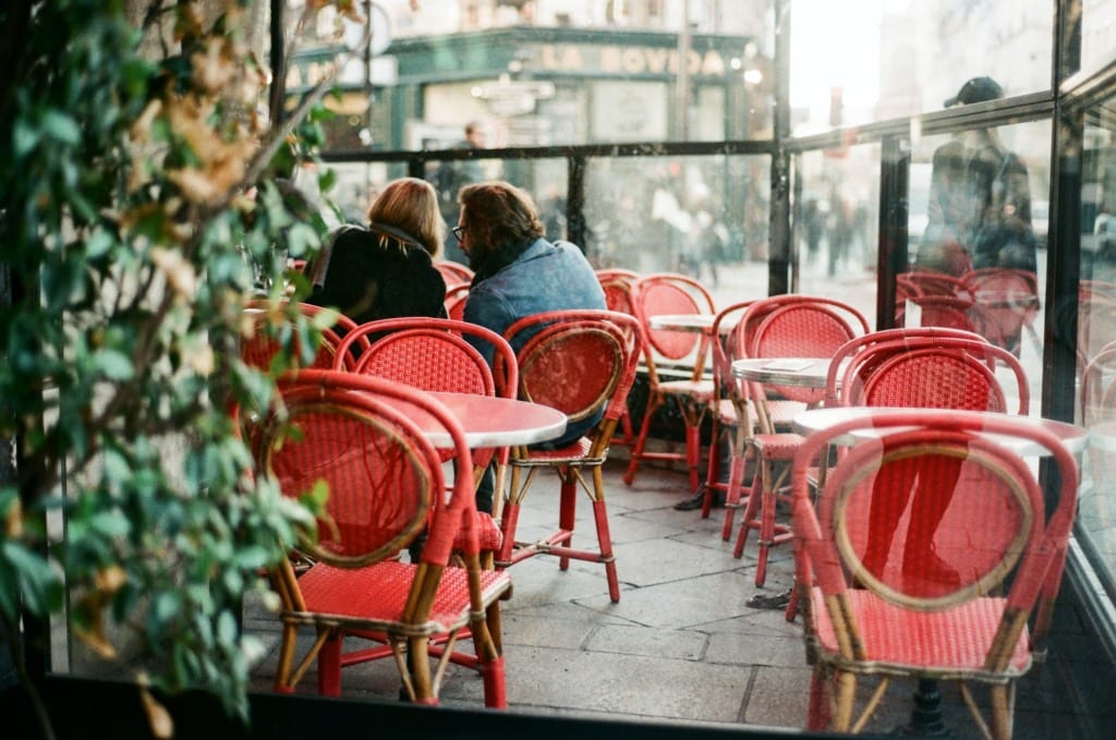 A lovely couple at a café in Paris