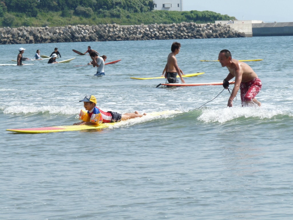 People surfing in Osaka
