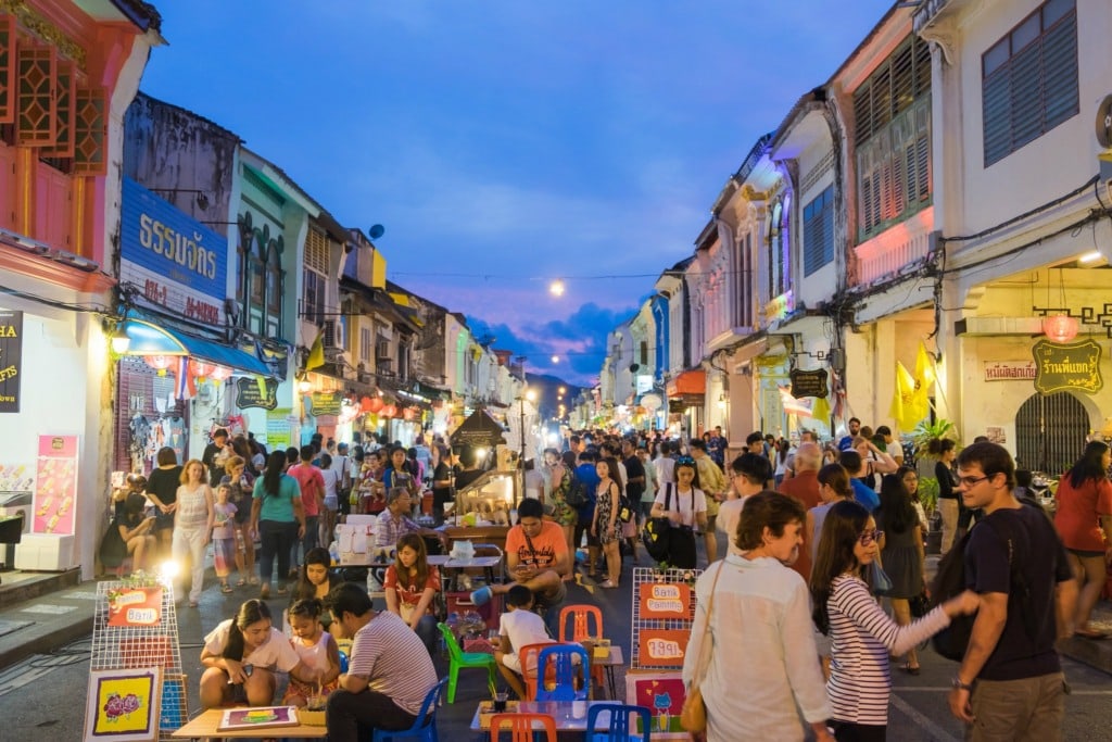 People shopping in Phuket Town Weekend Market in Thailand