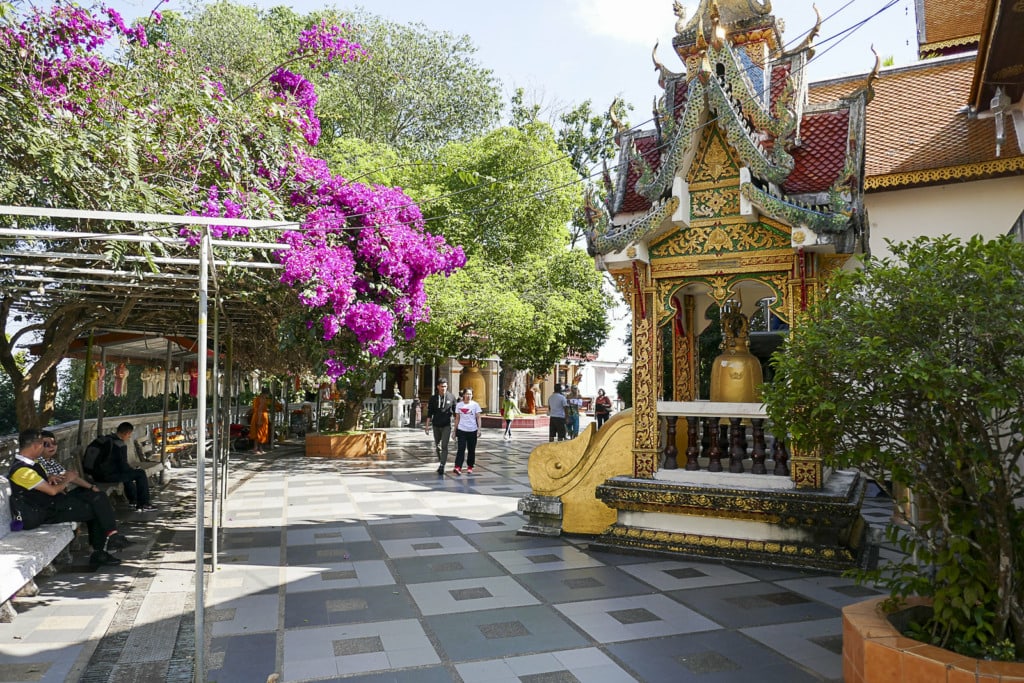 Tourists walking near Doi Suthep Temple in Chiang Mai