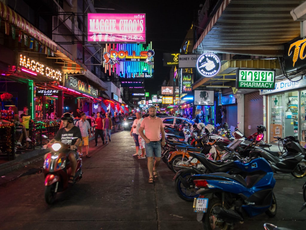 People walking street at night in Pattaya