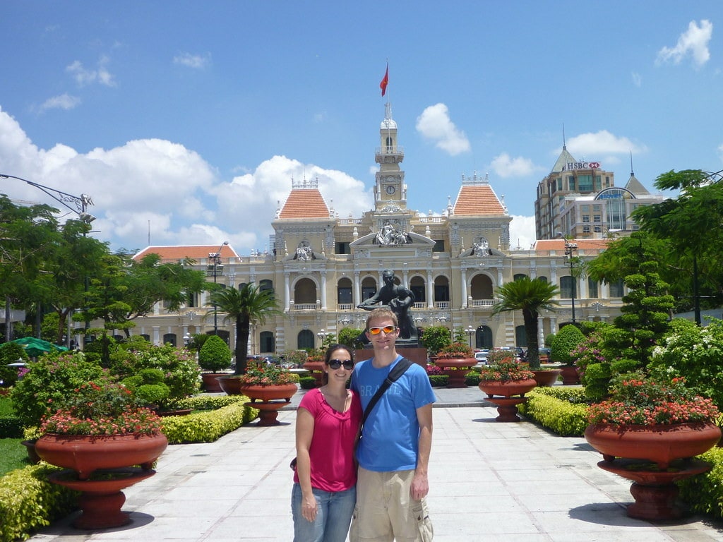 Kristen and Ryan in front of Ho Chi Minh City Hall