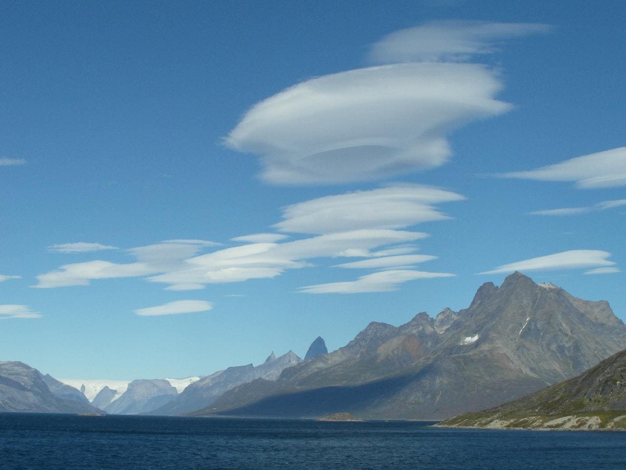 Lenticular Clouds forming from air flowing over mountains