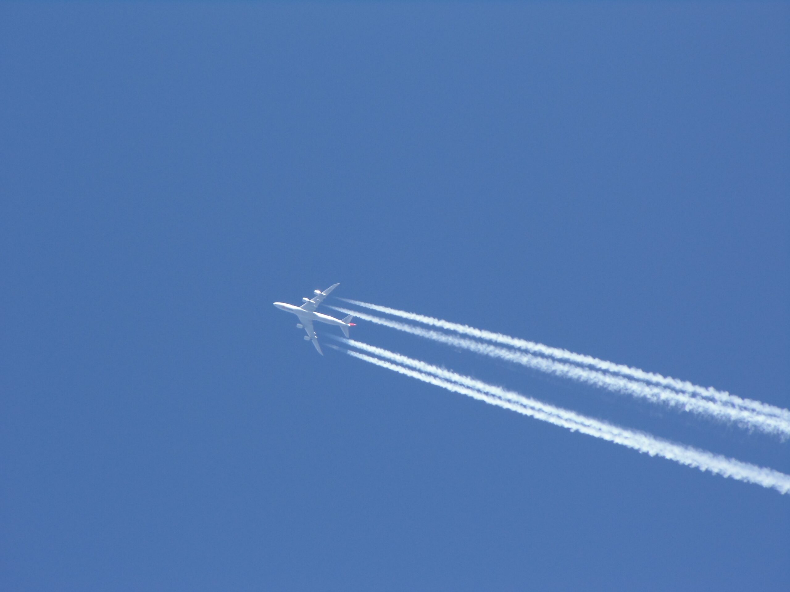 Contrails behind an airplane