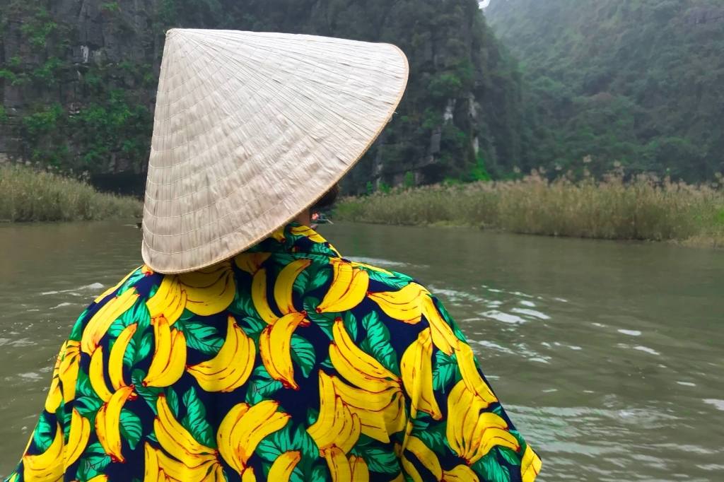 Tourist on boat wearing banana shirt