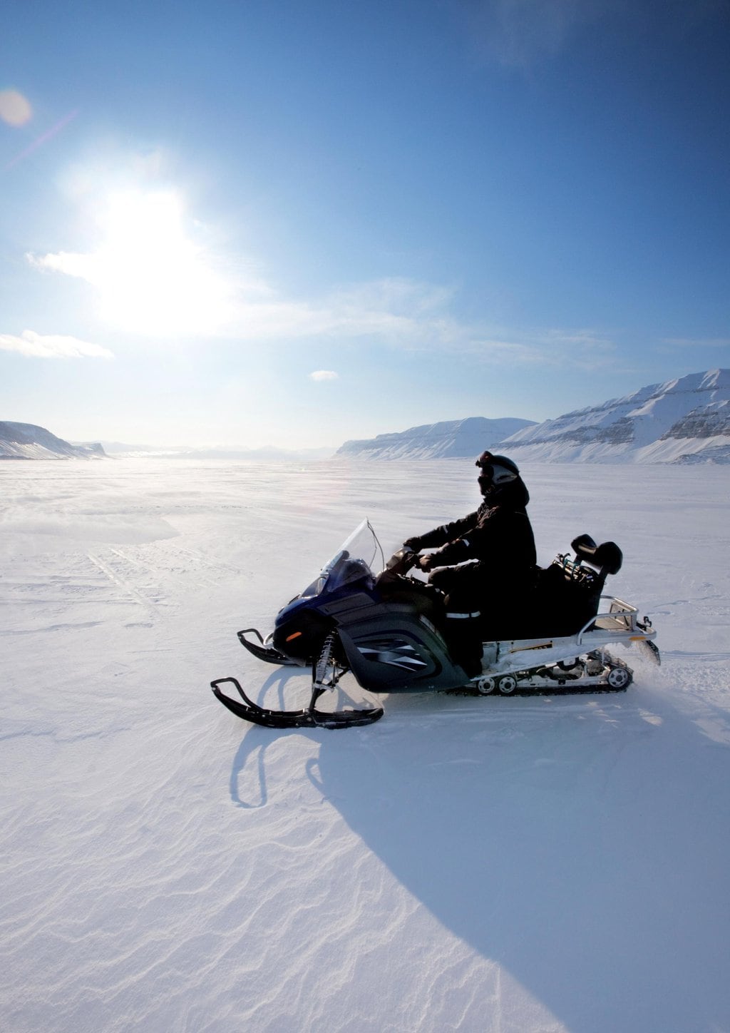 A person on a snowmobile