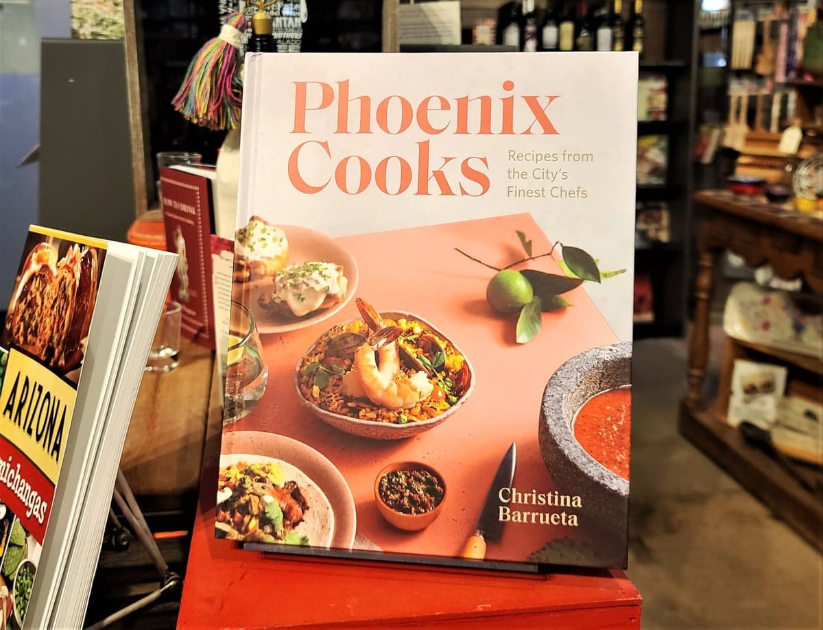 Phoenix Cooks book on a shelf at Changing Hands bookstore