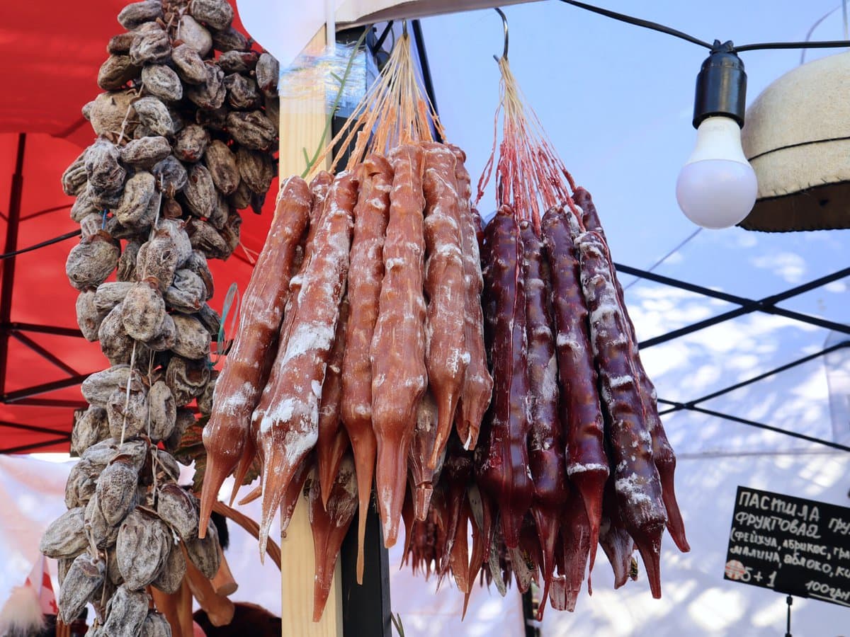 Georgian national homemade delicacy called churchkhela sold in a market in Tbilisi, Georgia