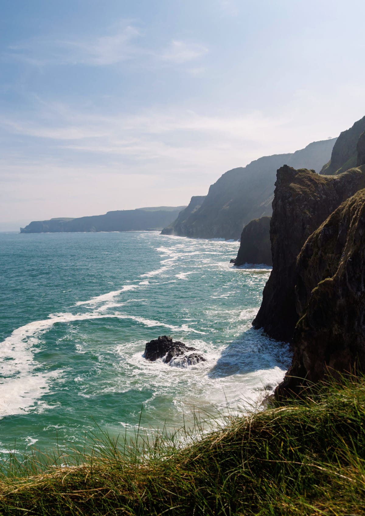 View of cliffs along the Causeway Coastal Route in Northern Ireland