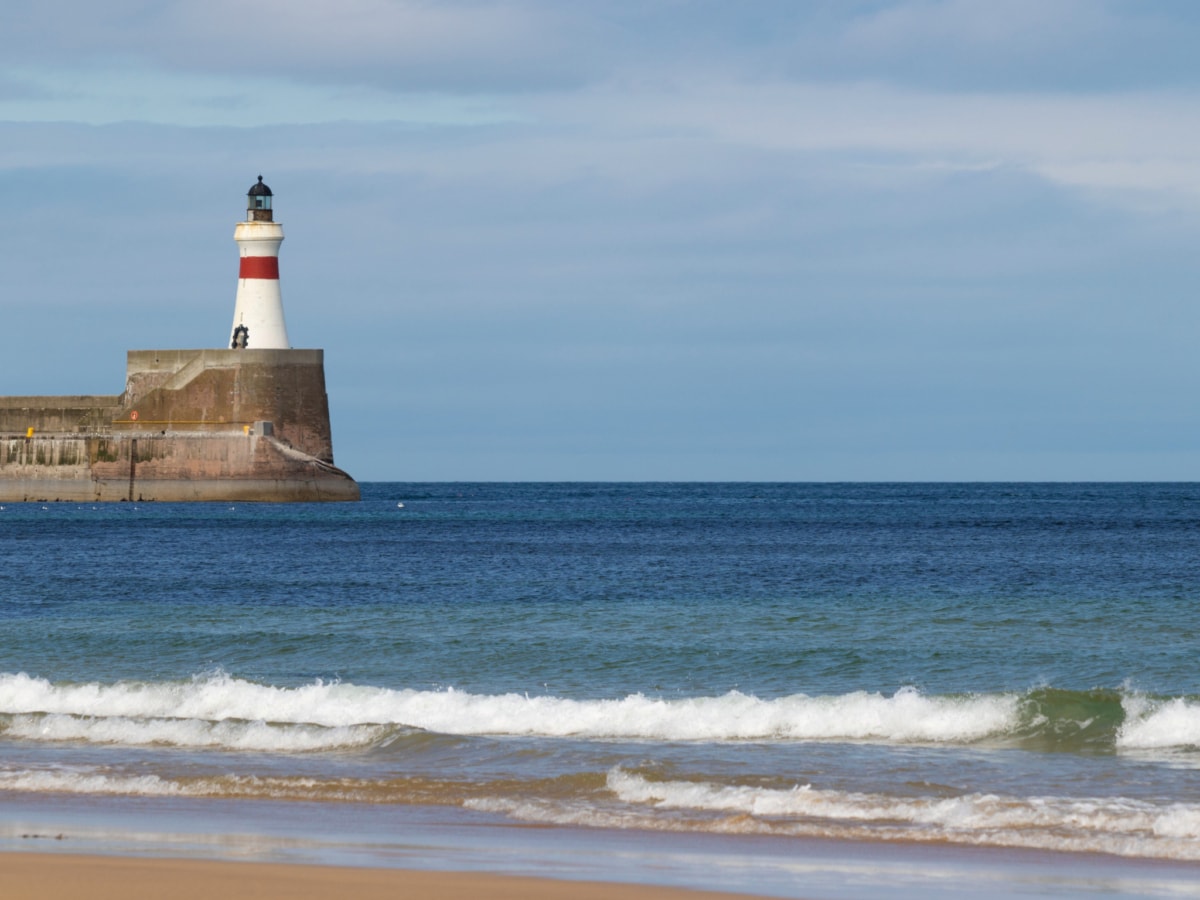 A lighthouse at the entrance to Fraserburgh harbour in Scotland
