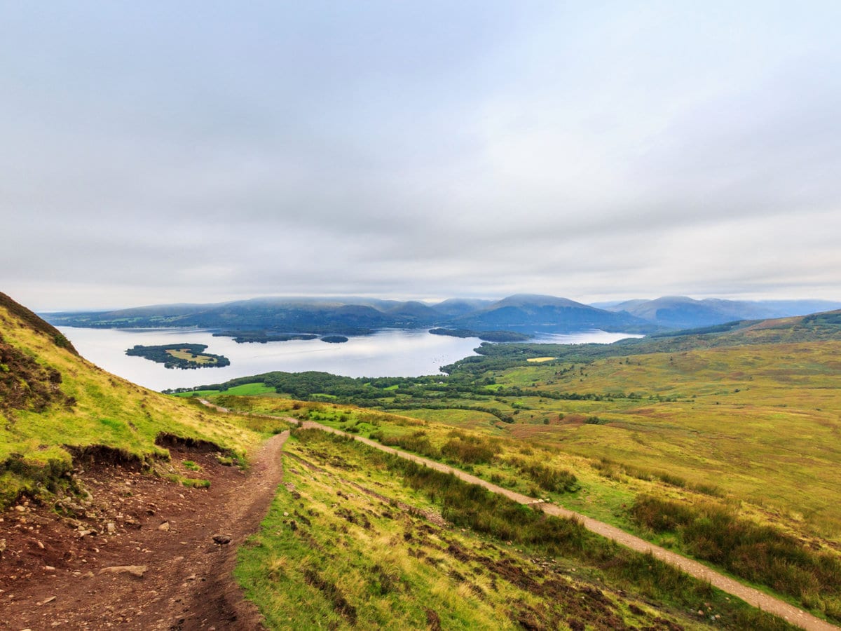 A panoramic view of Loch Lomond from Conic Hill in Balmaha, Scotland