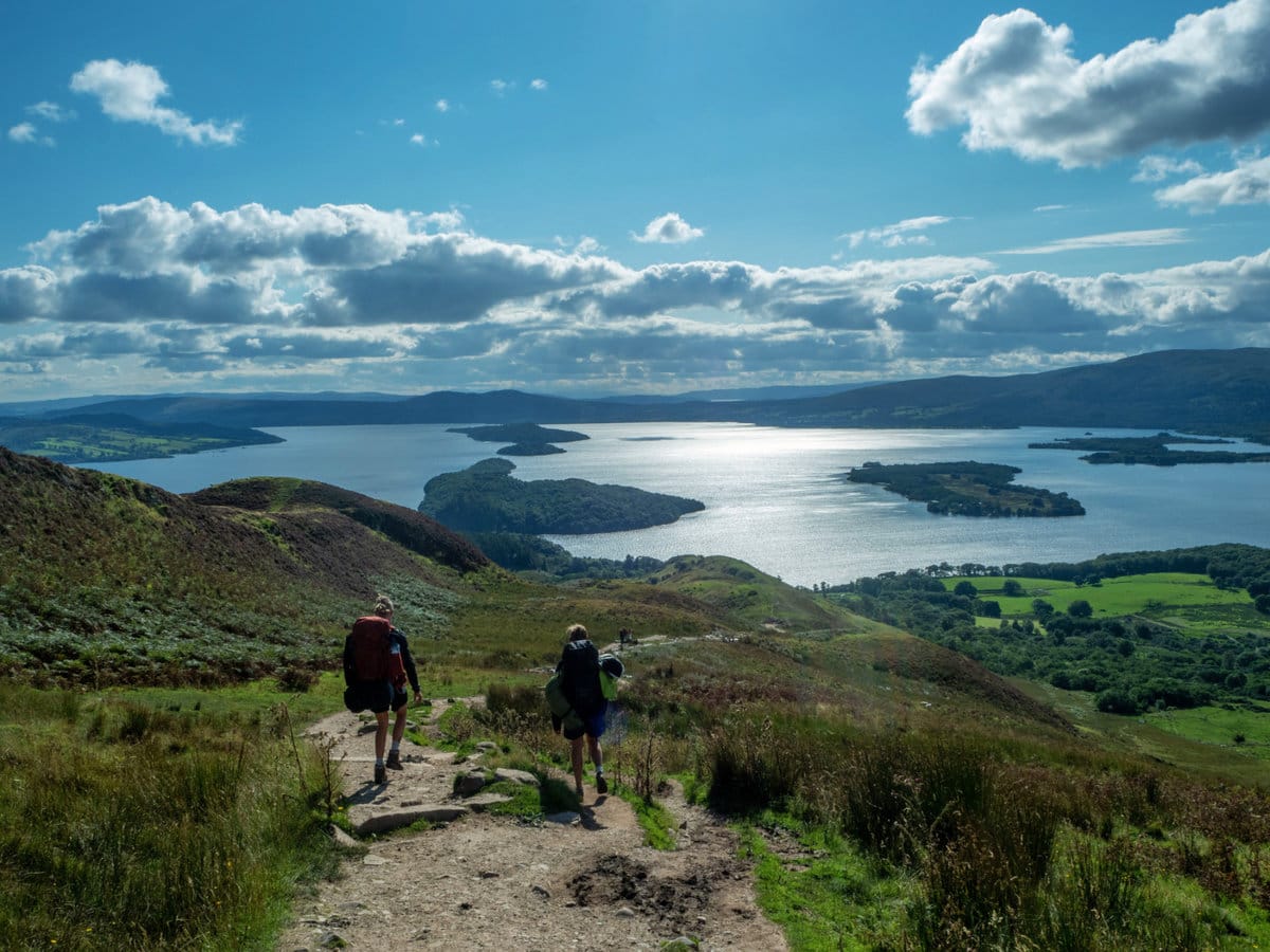 Two girls hiking to Loch Lomond in Scotland