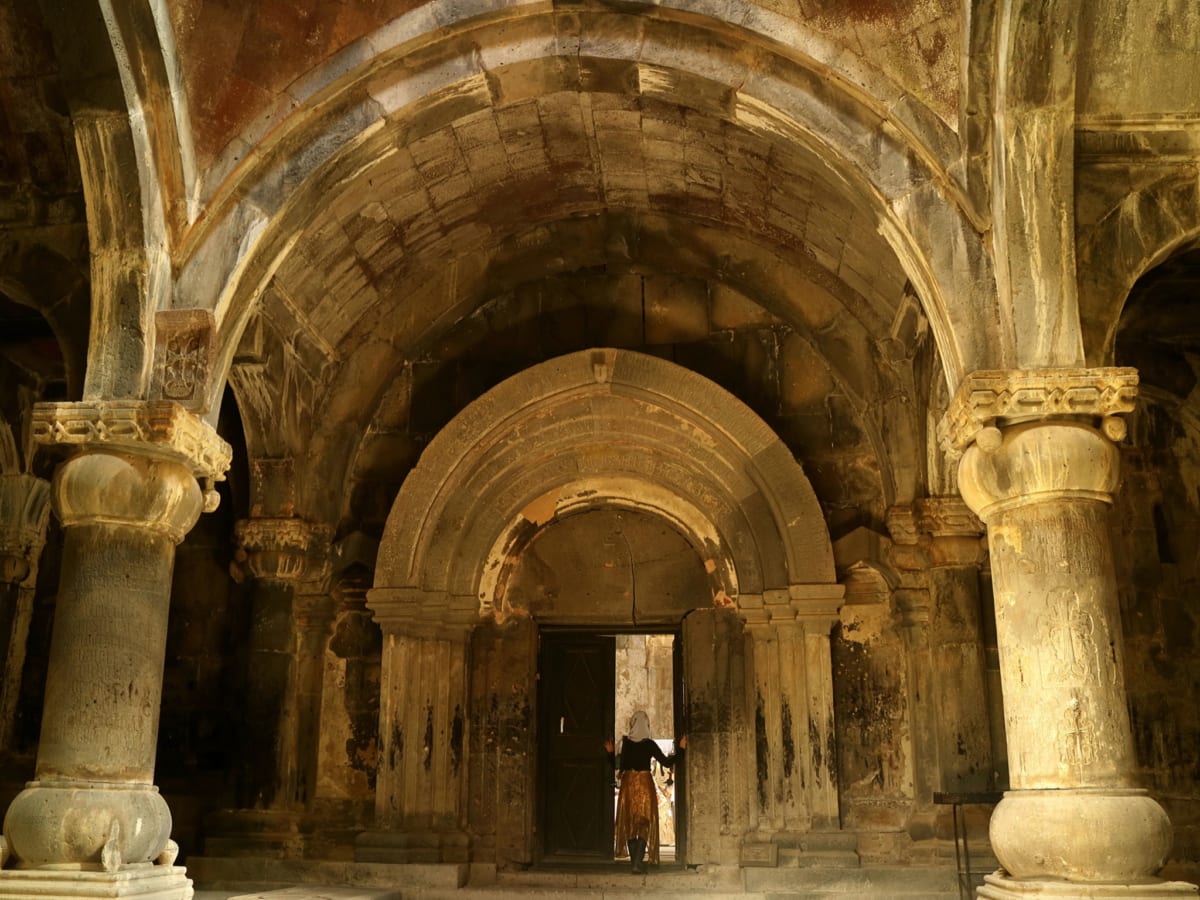 A tourist at the Chapel of Sanahin Medieval Monastery in Armenia