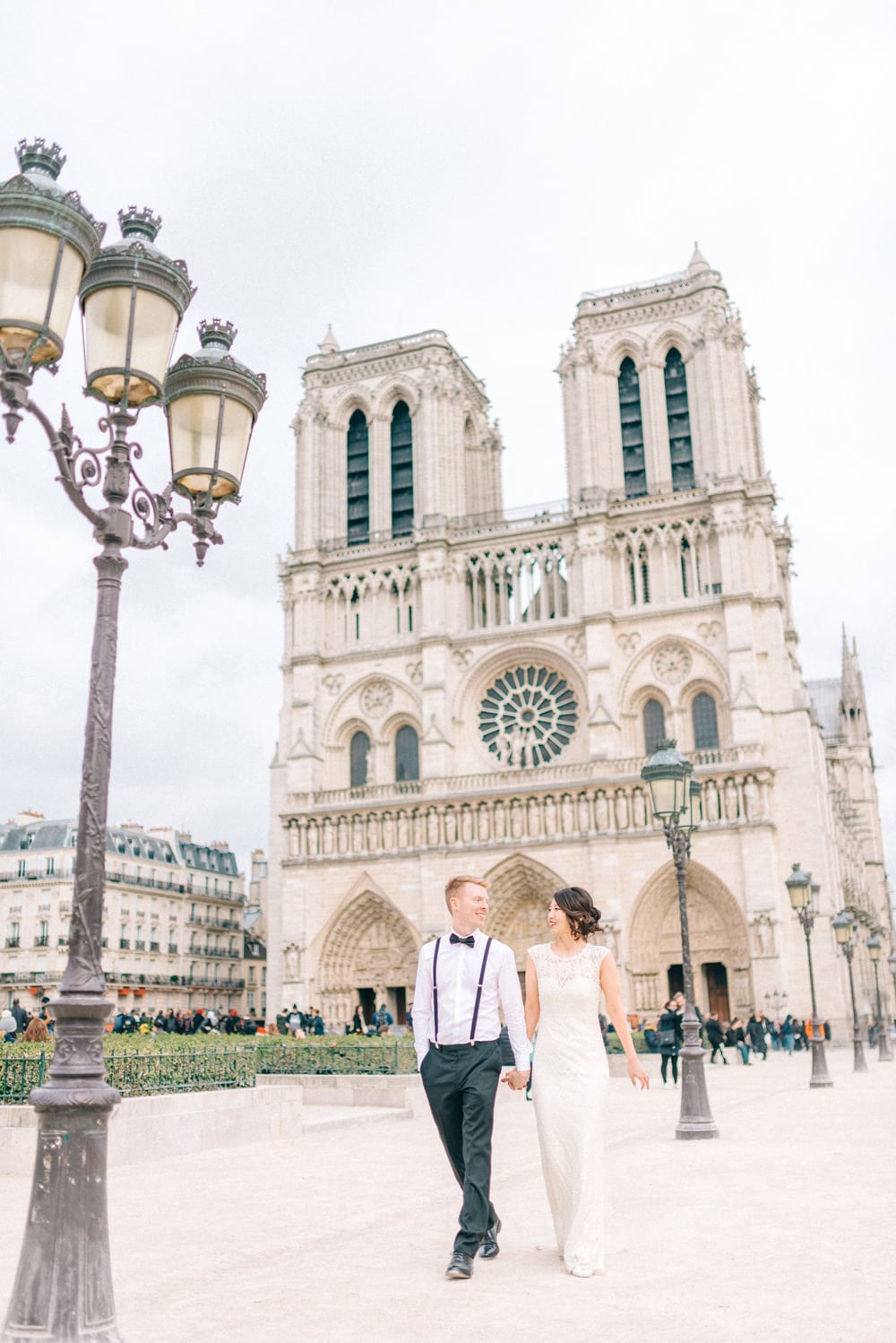 Couple at Notre-Dame de Paris - Honeymoon in Paris