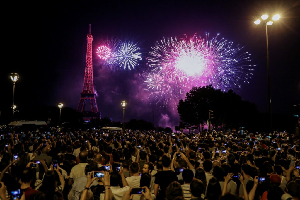 Crowd watching the Bastille Day Fireworks from Champs de Mars in Paris