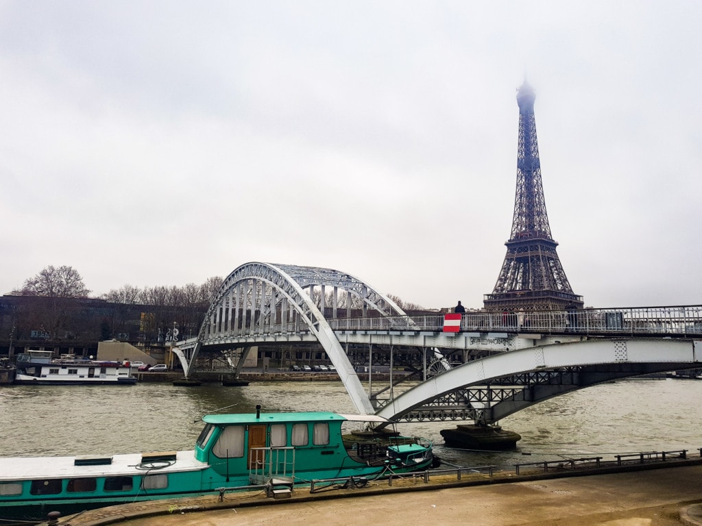 Passerelle Debilly bridge in front of the Eiffel Tower