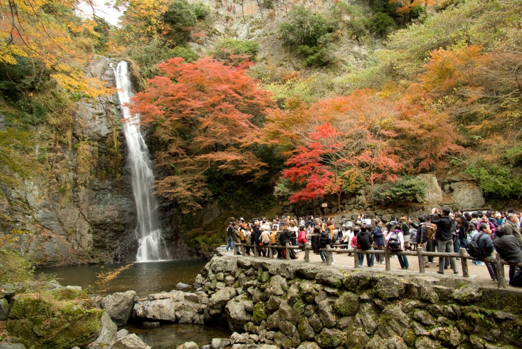 tourists near waterfall in Osaka