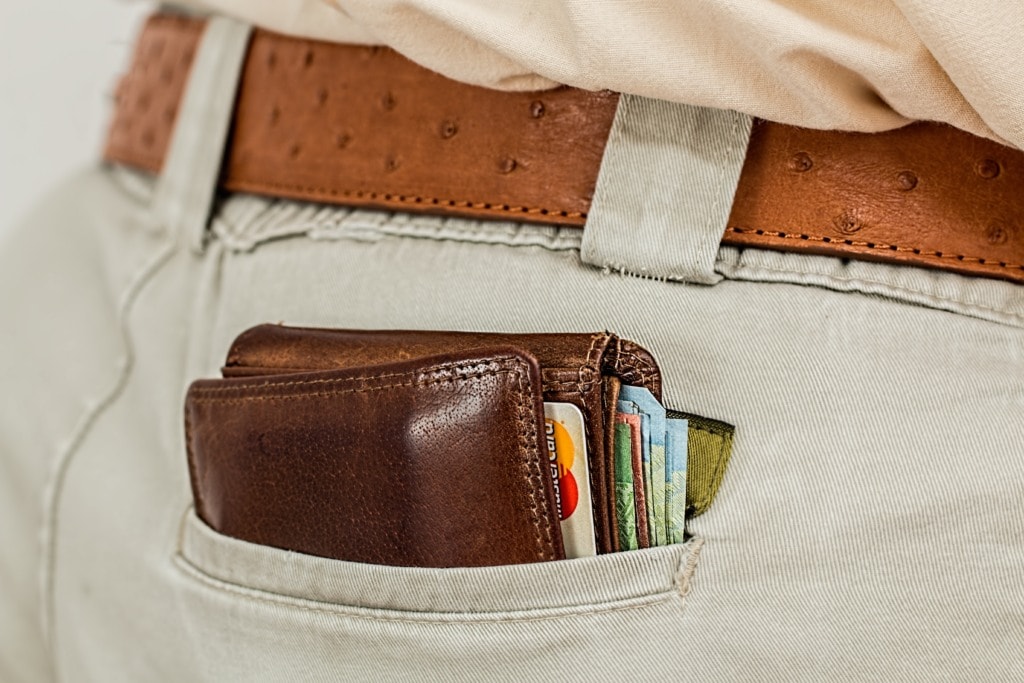 Don't leave your wallet in your back pocket like this for safety reasons. You'll be an easy prey for thieves and pickpockets