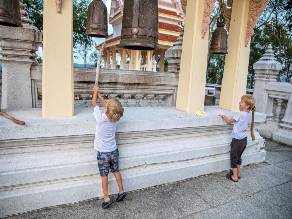 Kids Ringing a Bell at Pattaya Wat Mondop Temple