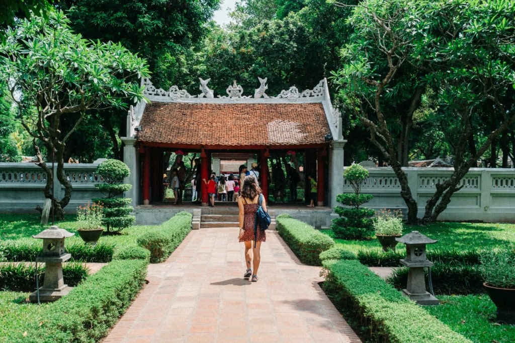 Tourist walking to the Temple of Literature in Hanoi