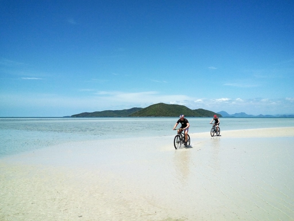 two friends as we were biking on the beach in south of the Island called Koh Samui in Thailand