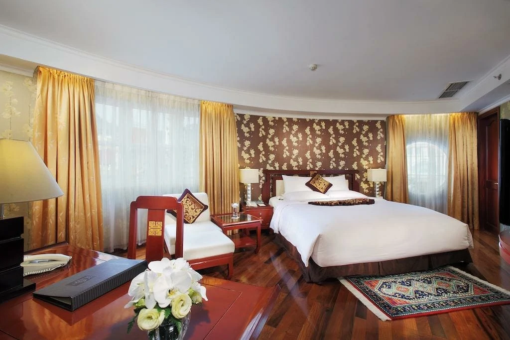 Rex Hotel Bedroom in Ho Chi Minh City