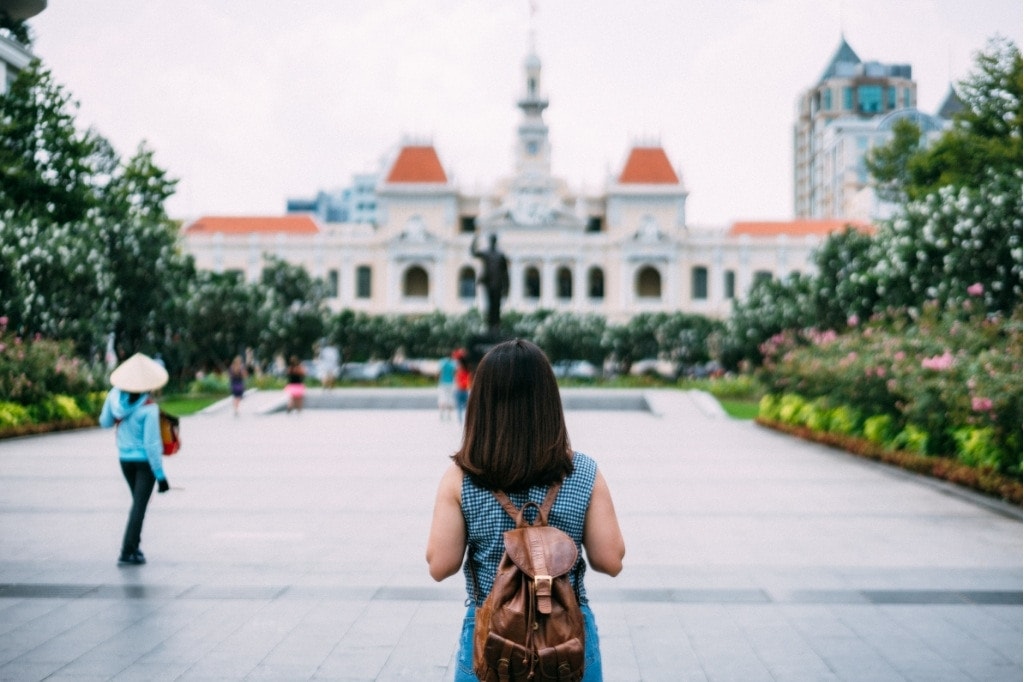 Women traveler near Ho Chi Minh City Hall in Vietnam