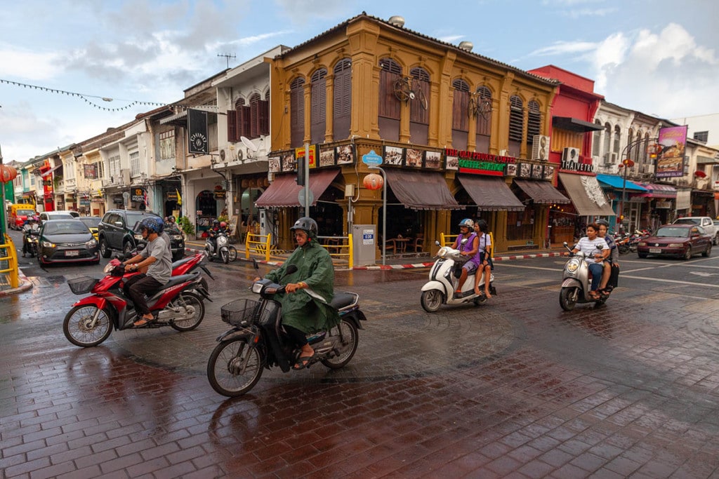 People and their bikes in Phuket town