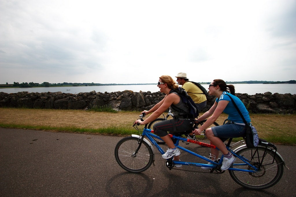 Tourists cycling across England