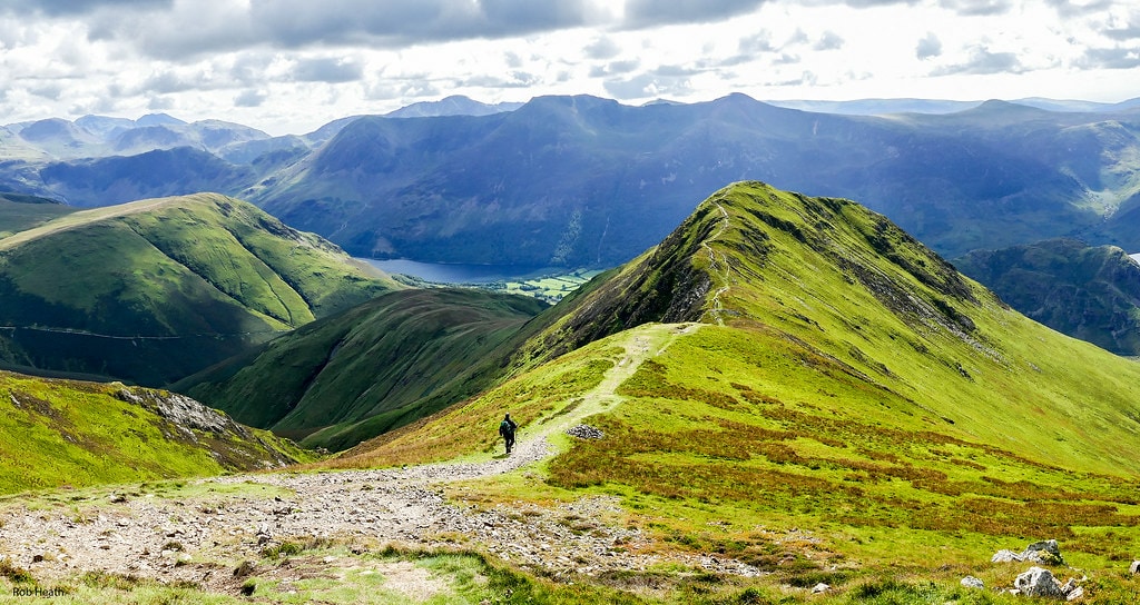 Man Approaching Whiteless Pike in Great Britain
