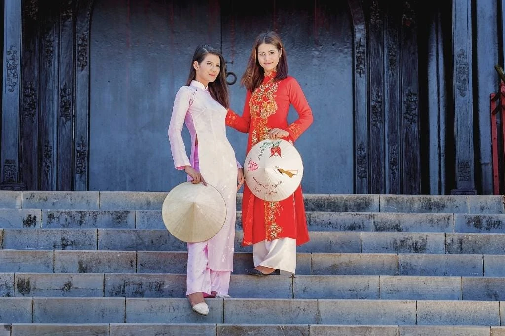 Women wearing Ao Dai dress in Vietnam