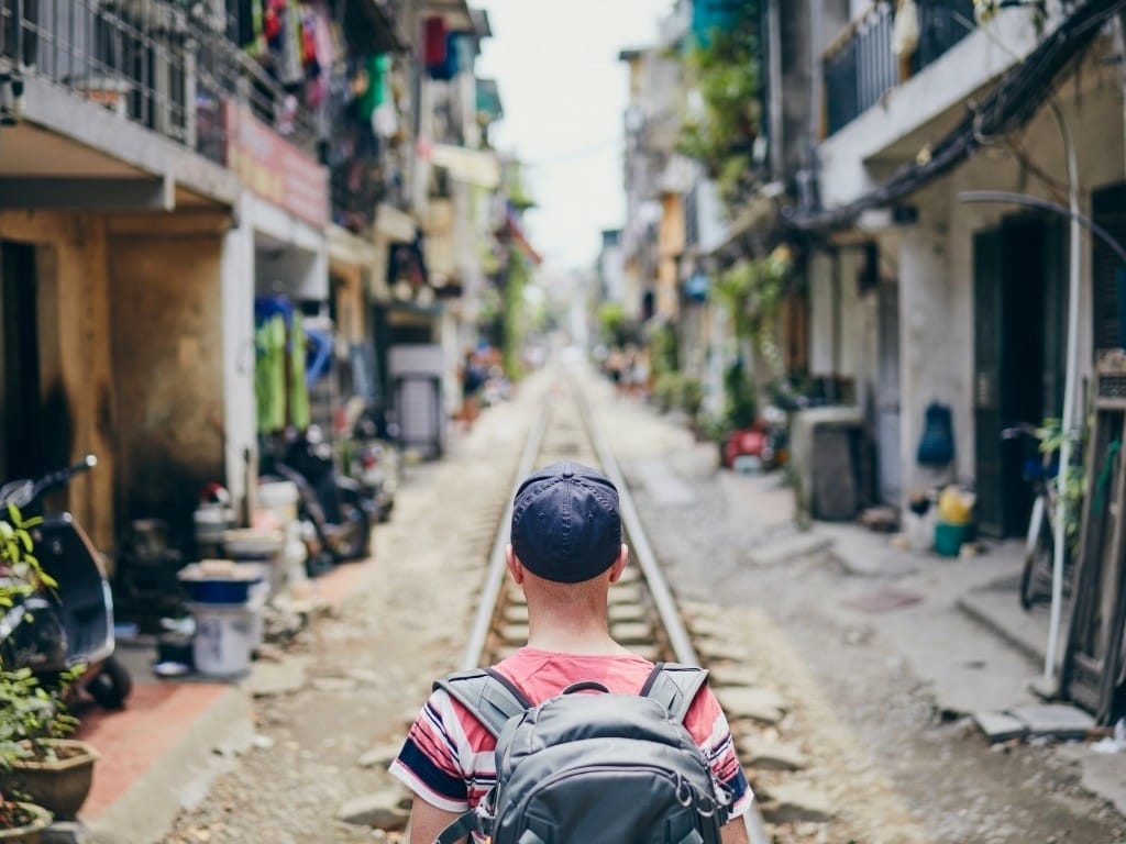 A tourist at the Hanoi train street