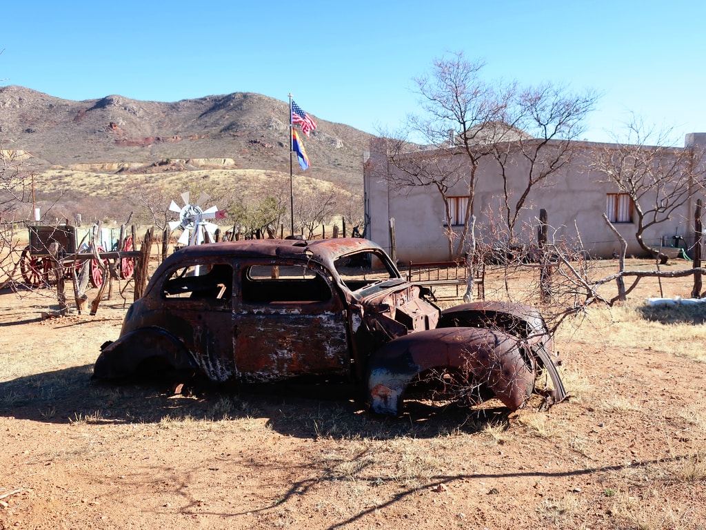 Old bullet-ridden old car in the ghost town of Gleeson, Arizona