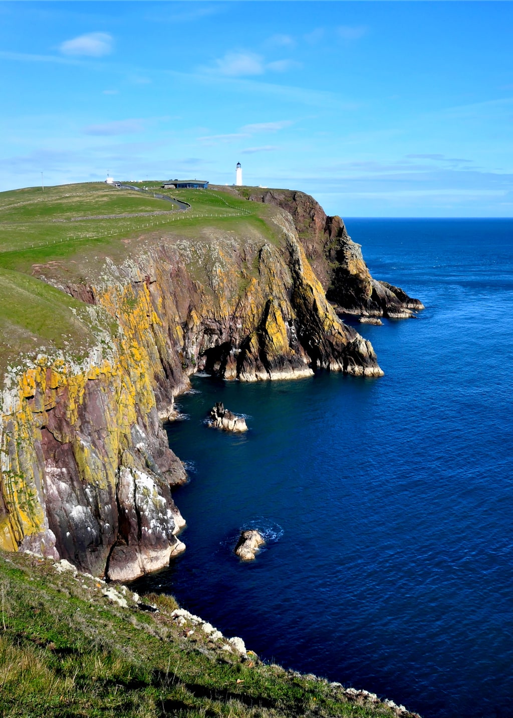 Sunny day on the Mull of Galloway and its lighthouse, South West of Scotland