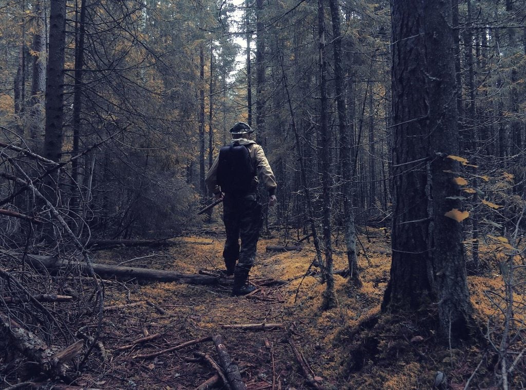 A man going hunting in Alaska